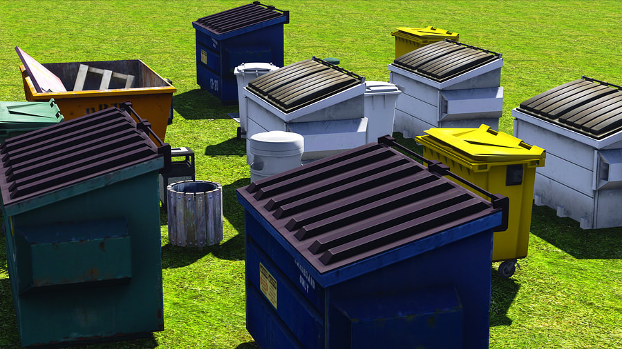 dumpsters on the grass